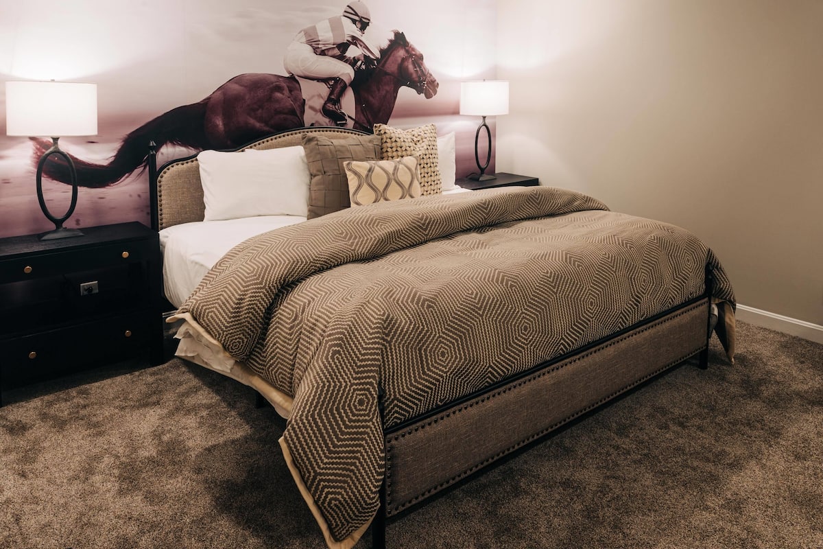 Suite, Multiple Beds (Thoroughbred) | In-room safe, desk, laptop workspace, iron/ironing board