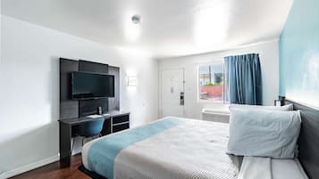 Escritorio, cortinas blackout, wifi gratis y ropa de cama