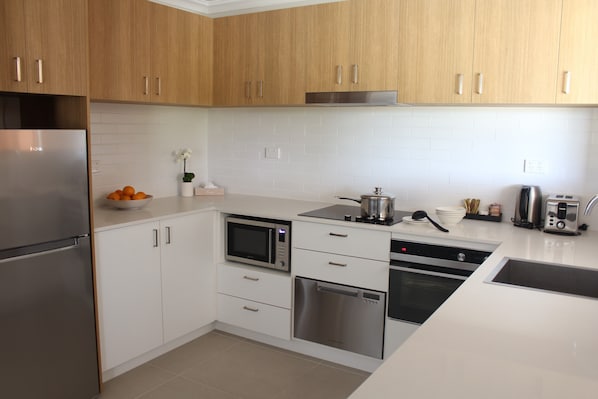 Three Bedroom Apartment | Private kitchenette | Fridge, microwave, coffee/tea maker, electric kettle