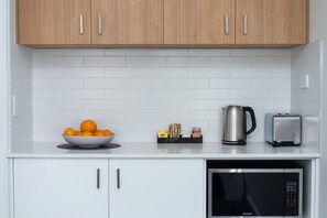 Fridge, microwave, coffee/tea maker, electric kettle