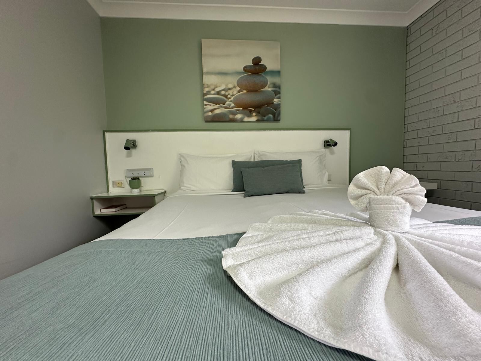 Premium bedding, pillow-top beds, desk, laptop workspace
