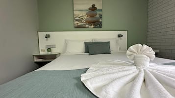 Ropa de cama de alta calidad, colchones con pillow-top y escritorio