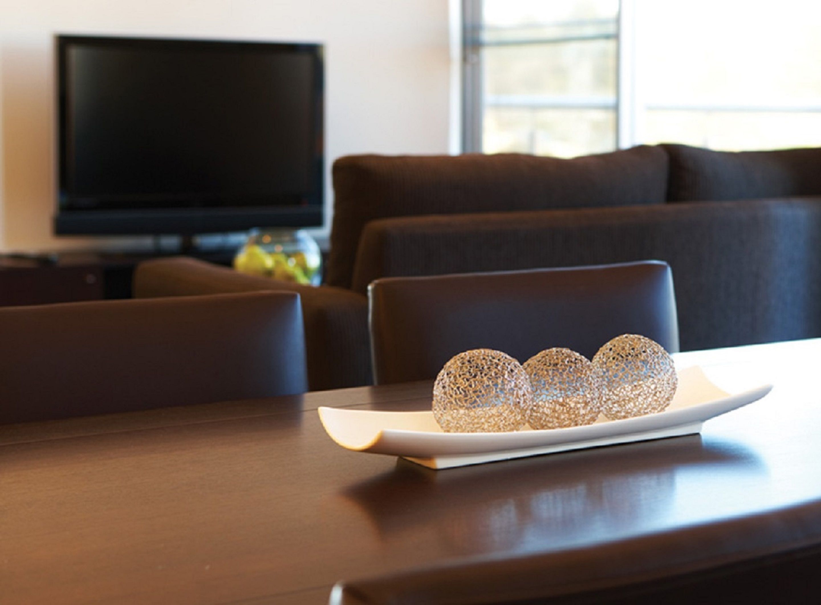 two bedroom apartment | living area | tv, ipod dock, pay films