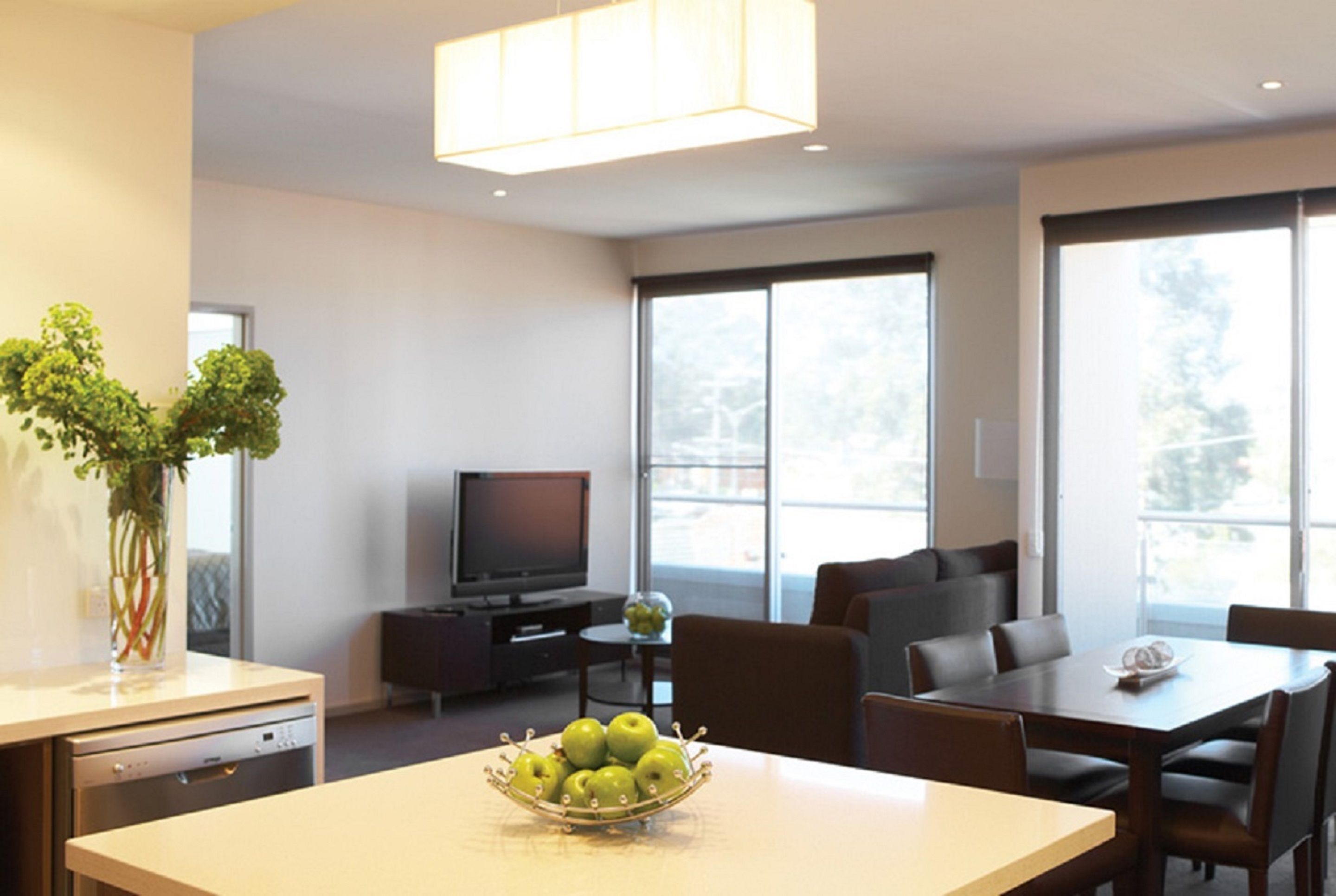 two bedroom apartment | living area | tv, ipod dock, pay films