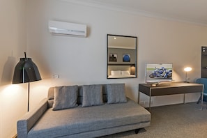 Blackout drapes, iron/ironing board, free WiFi, bed sheets