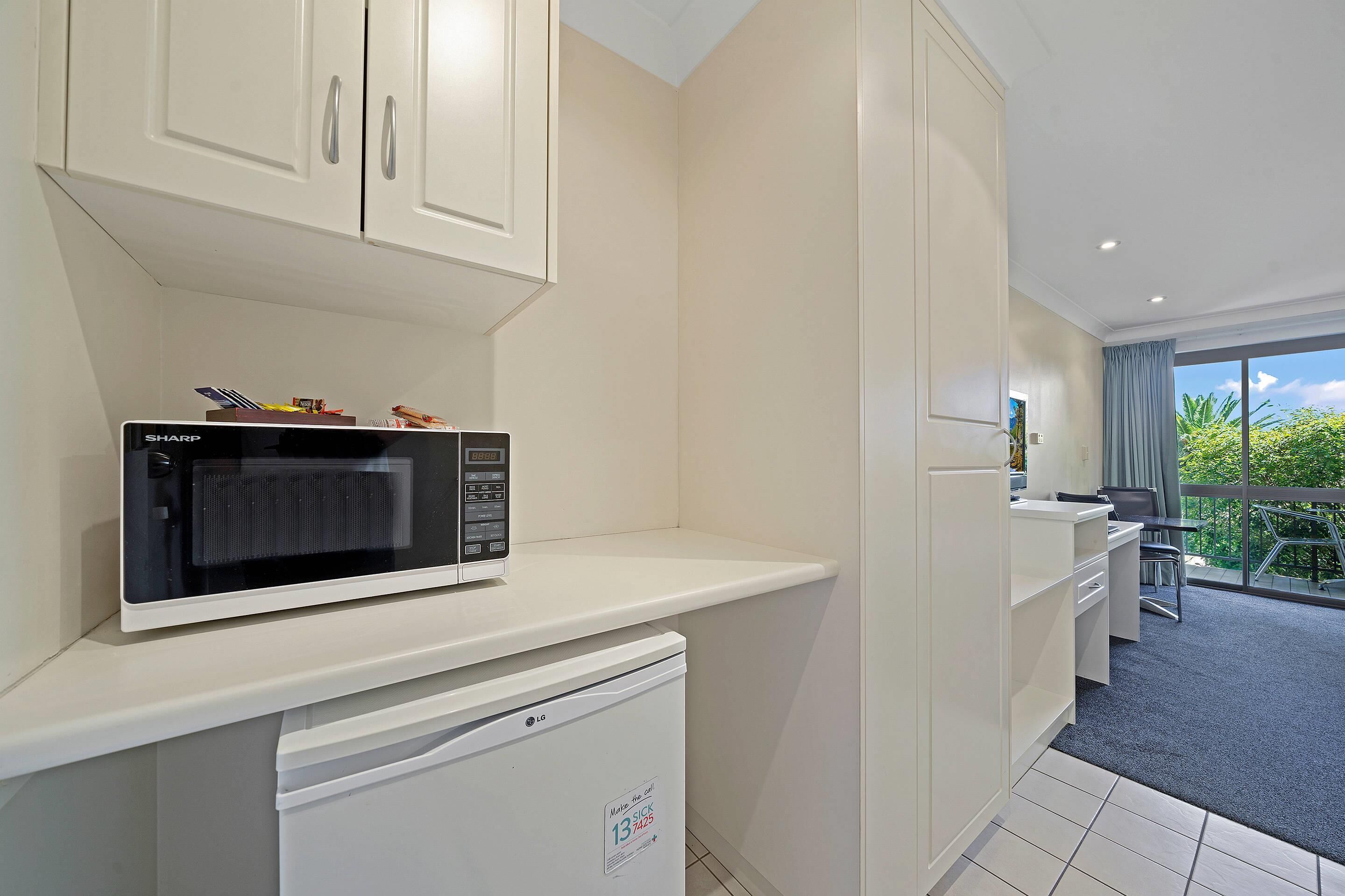 standard queen room, garden view with balcony” | premium bedding, individually decorated, individually furnished, desk