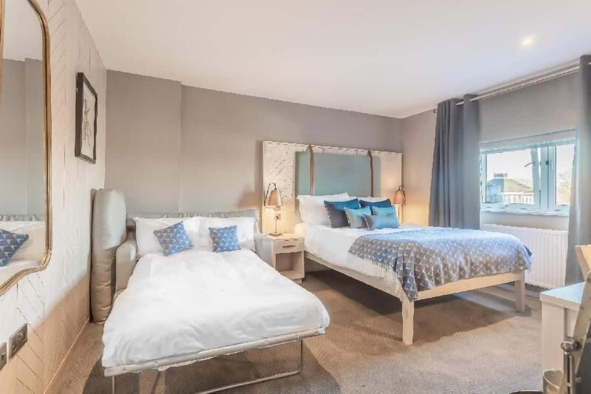 Hypoallergeen beddengoed, een minibar, een kluis op de kamer, een bureau