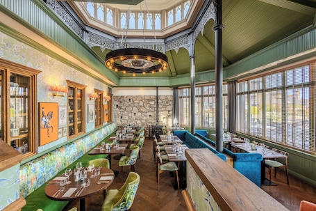 Breakfast, lunch and dinner served. Palm Court Hotel