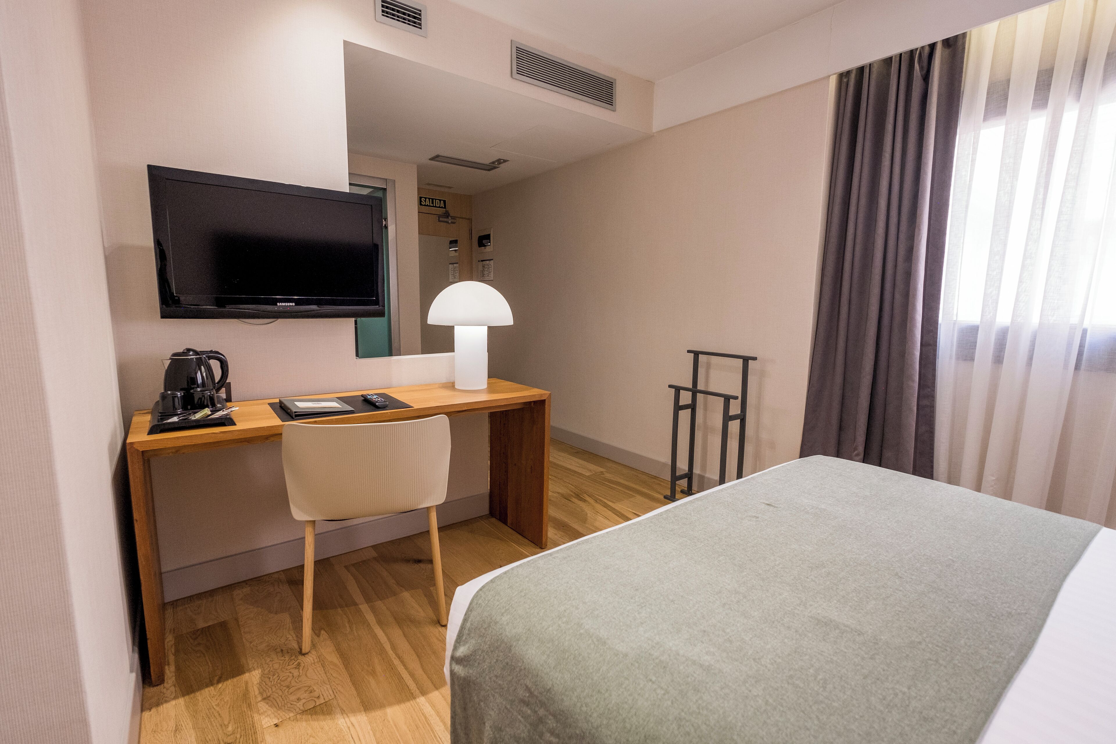 standard double room single use | minibar, in-room safe, desk, laptop workspace