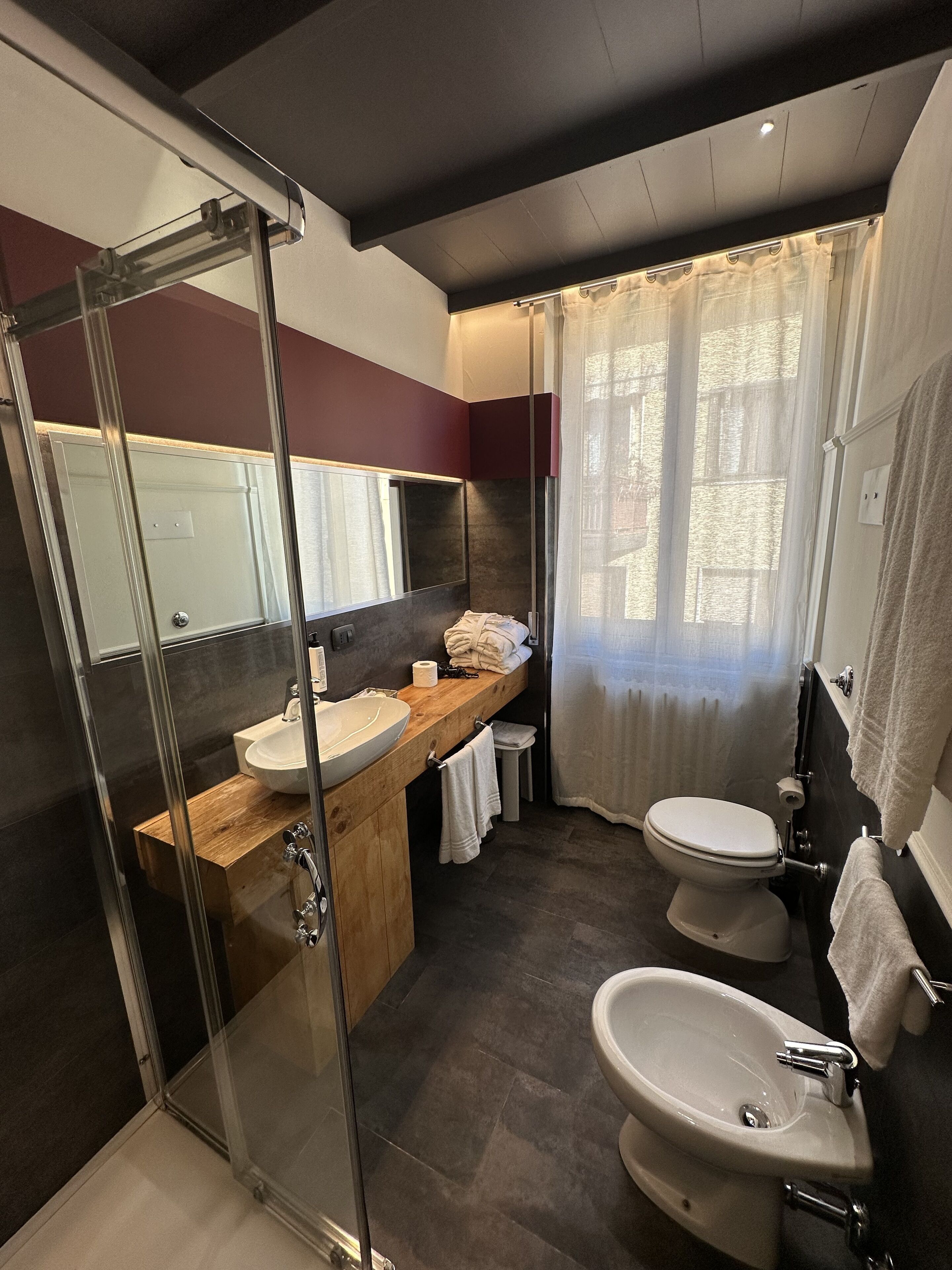 superior double room single use | bathroom | shower, eco-friendly toiletries, hair dryer, towels