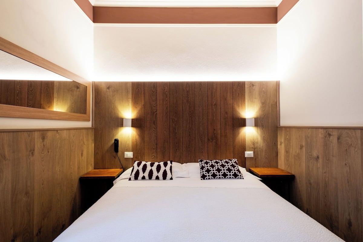 Economy Double Room, 1 Queen Bed | 1 bedroom, minibar, in-room safe, desk