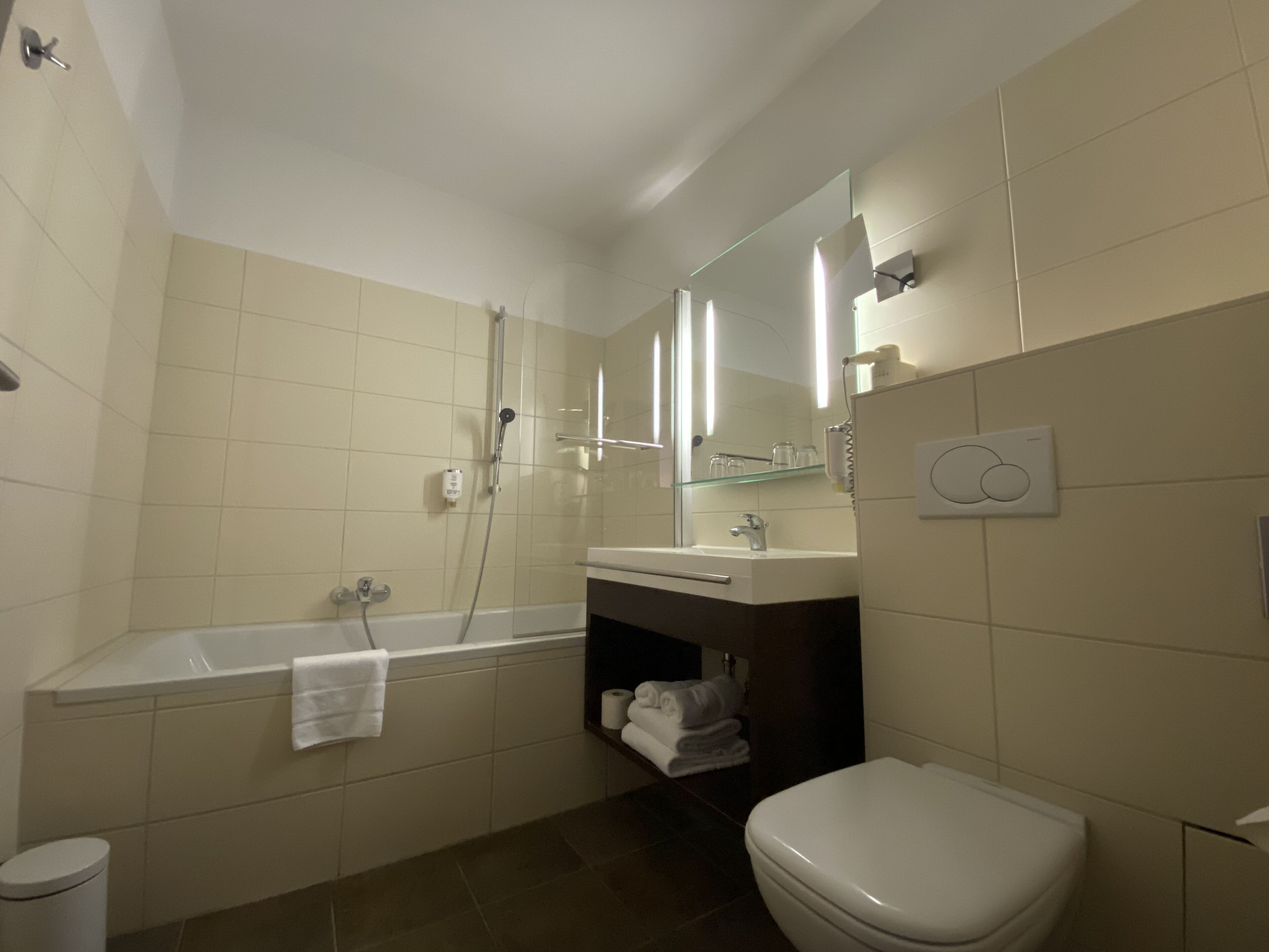 family room, city view | bathroom | hair dryer, towels
