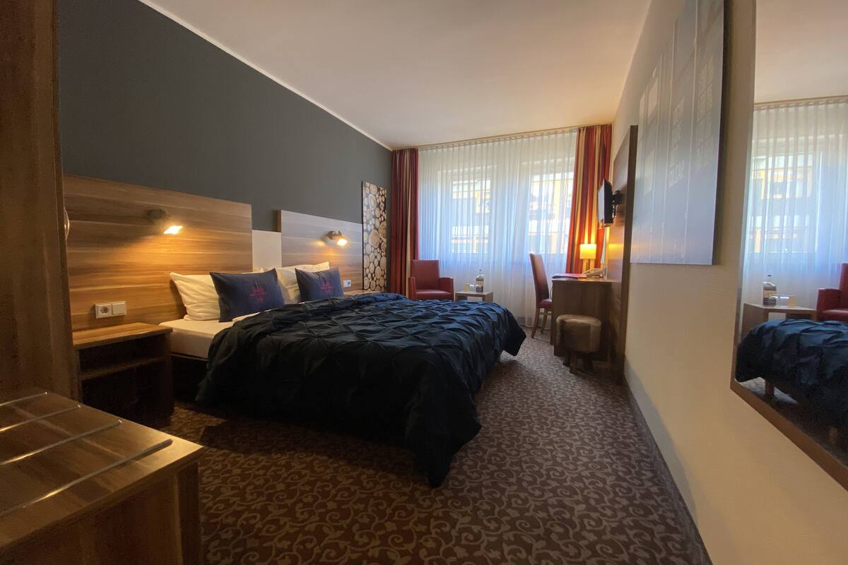 standard double room, city view | hypo-allergenic bedding, in-room safe, individually decorated, desk