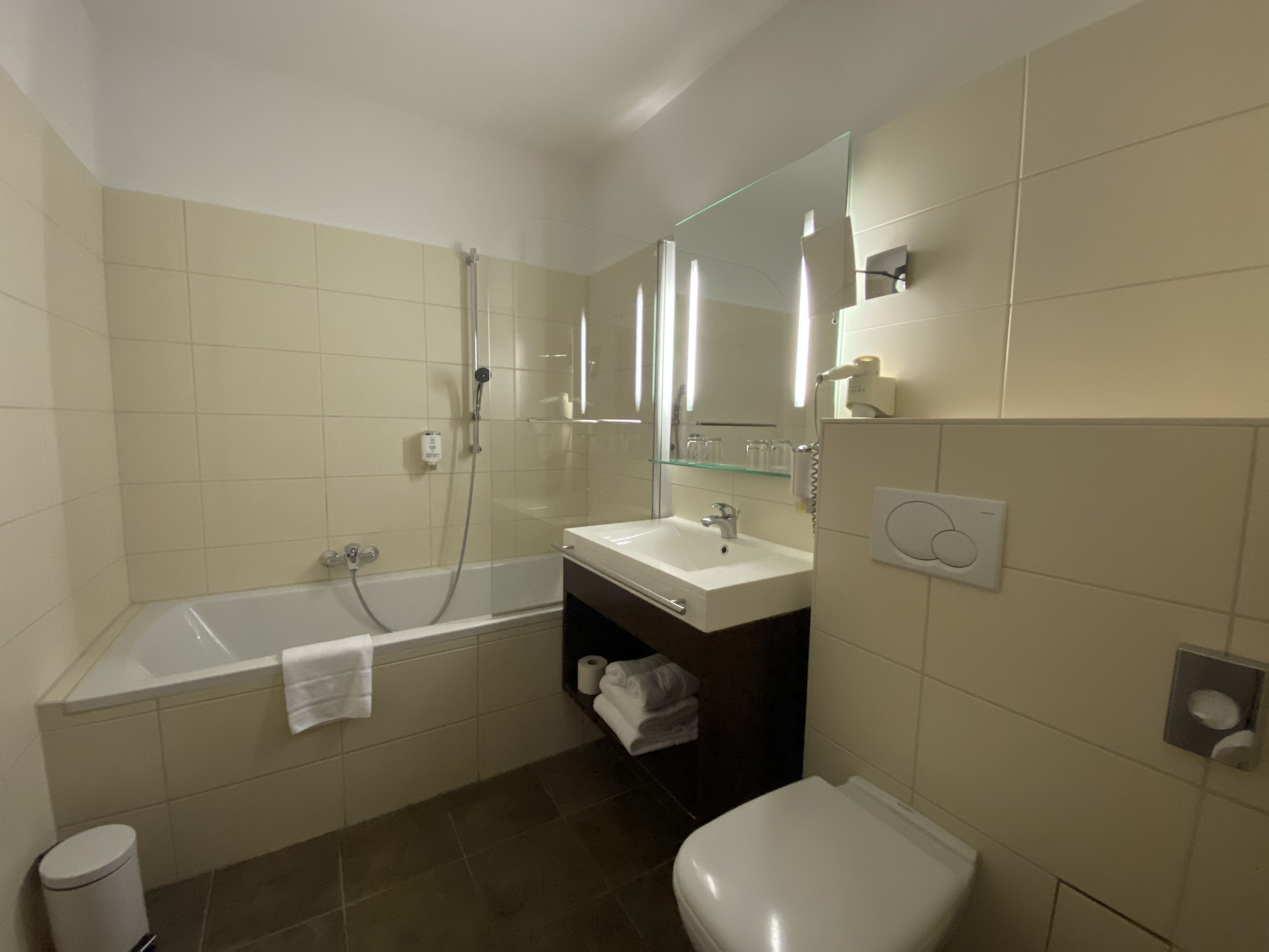 standard double room, city view | bathroom | hair dryer, towels