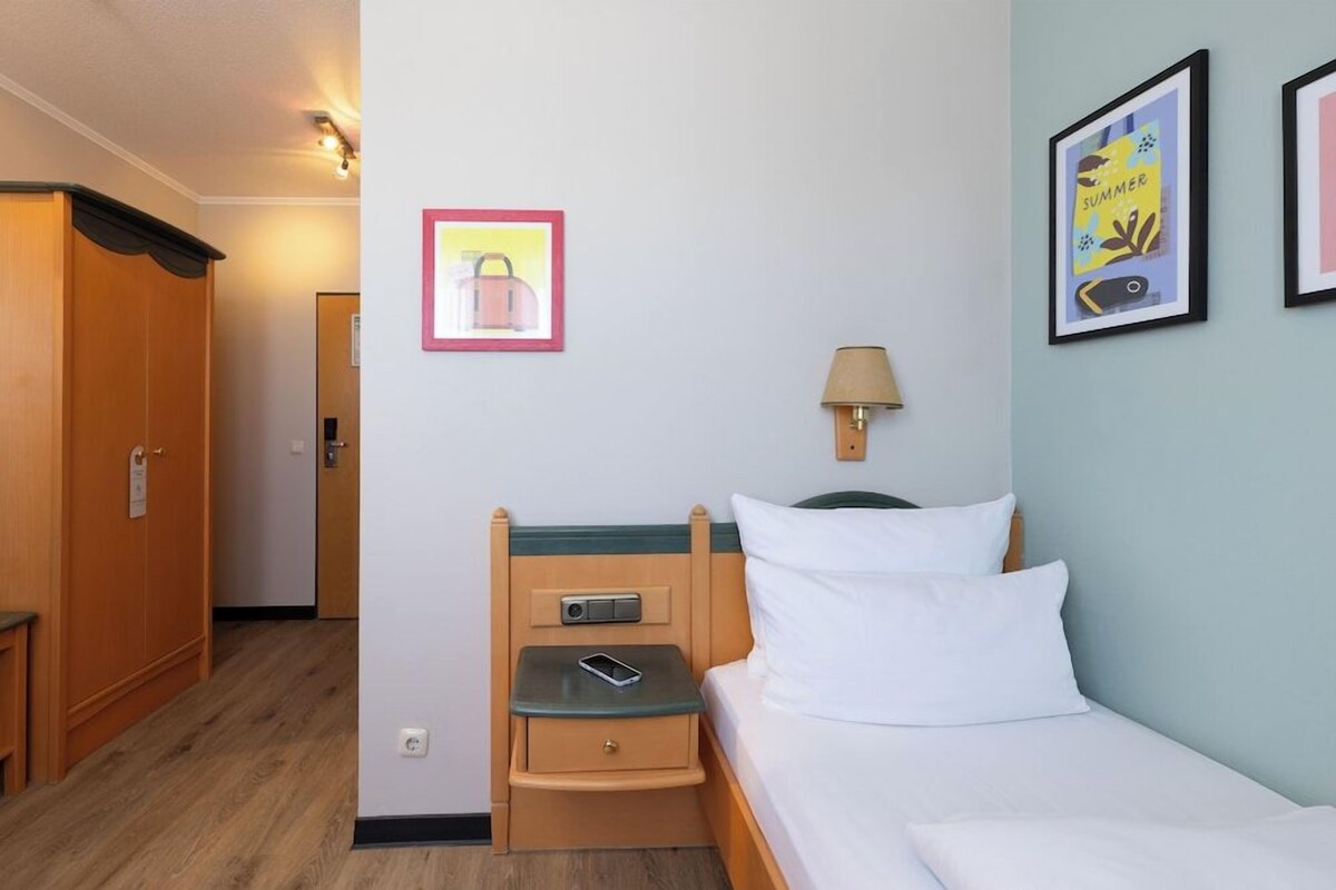 Luxe beddengoed, een minibar, een kluis op de kamer, een bureau