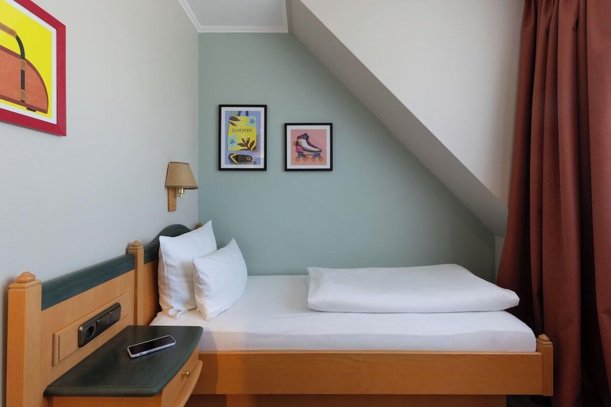 Luxe beddengoed, een minibar, een kluis op de kamer, een bureau