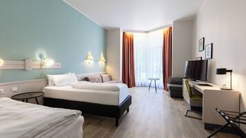 Chambre Confort, non-fumeurs | Literie de qualité supérieure, minibar, coffres-forts dans les chambres