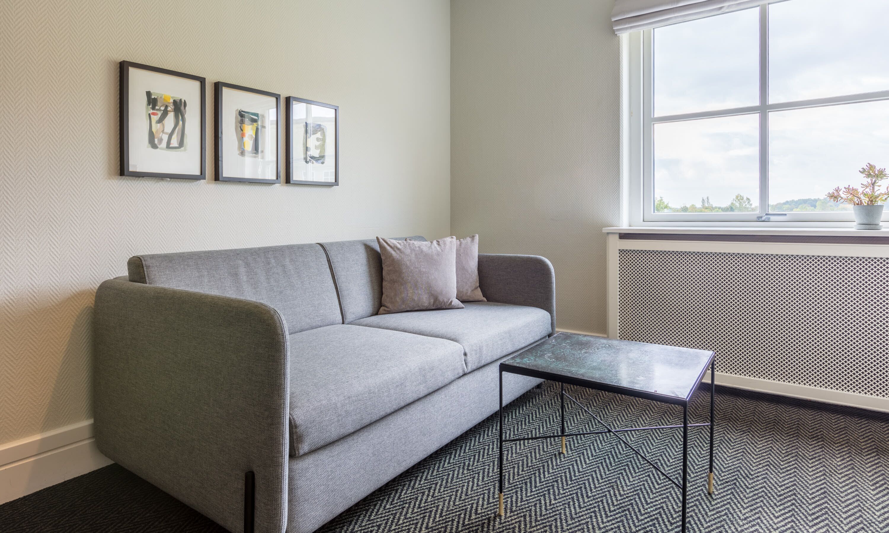 suite, 1 king bed with sofa bed, non smoking | hypo-allergenic bedding, desk, blackout curtains, cots/infant beds