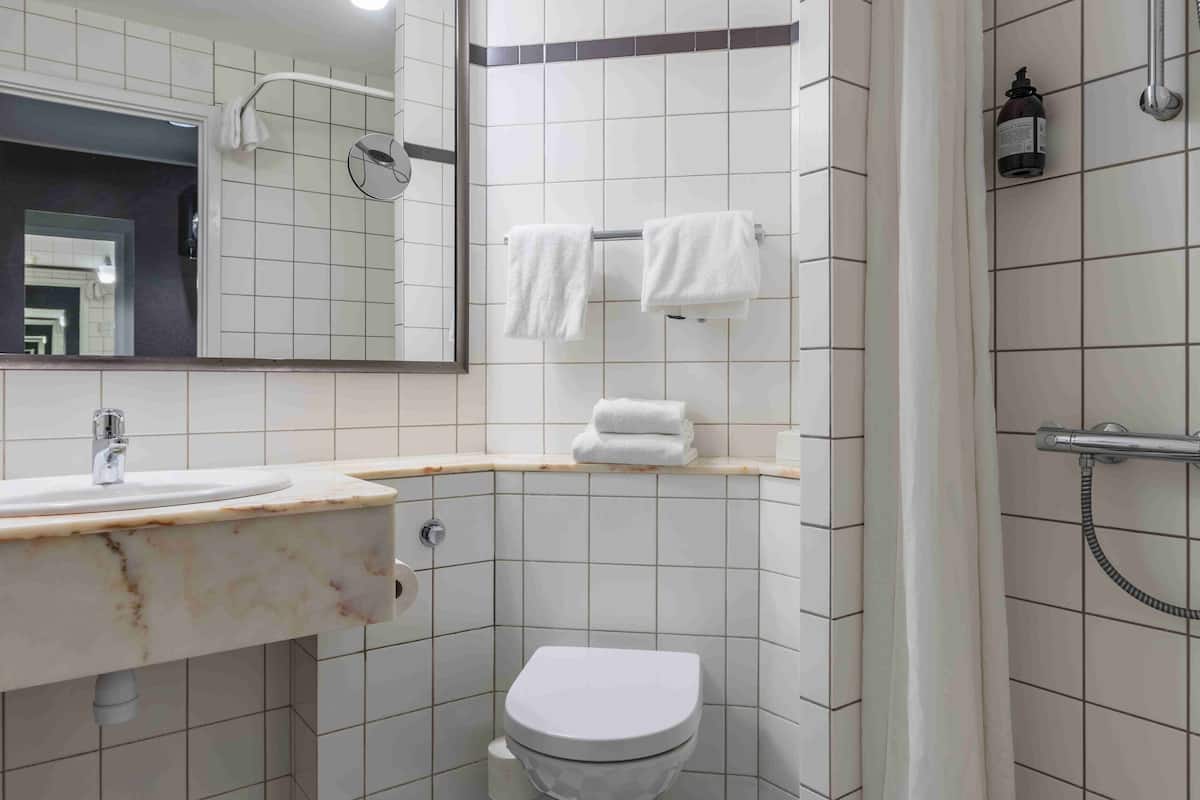 shower, eco-friendly toiletries, hair dryer, towels