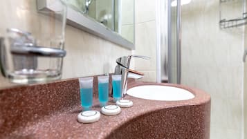 Shower, free toiletries, hair dryer, towels