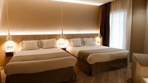Cortinas blackout, wifi gratis y ropa de cama 