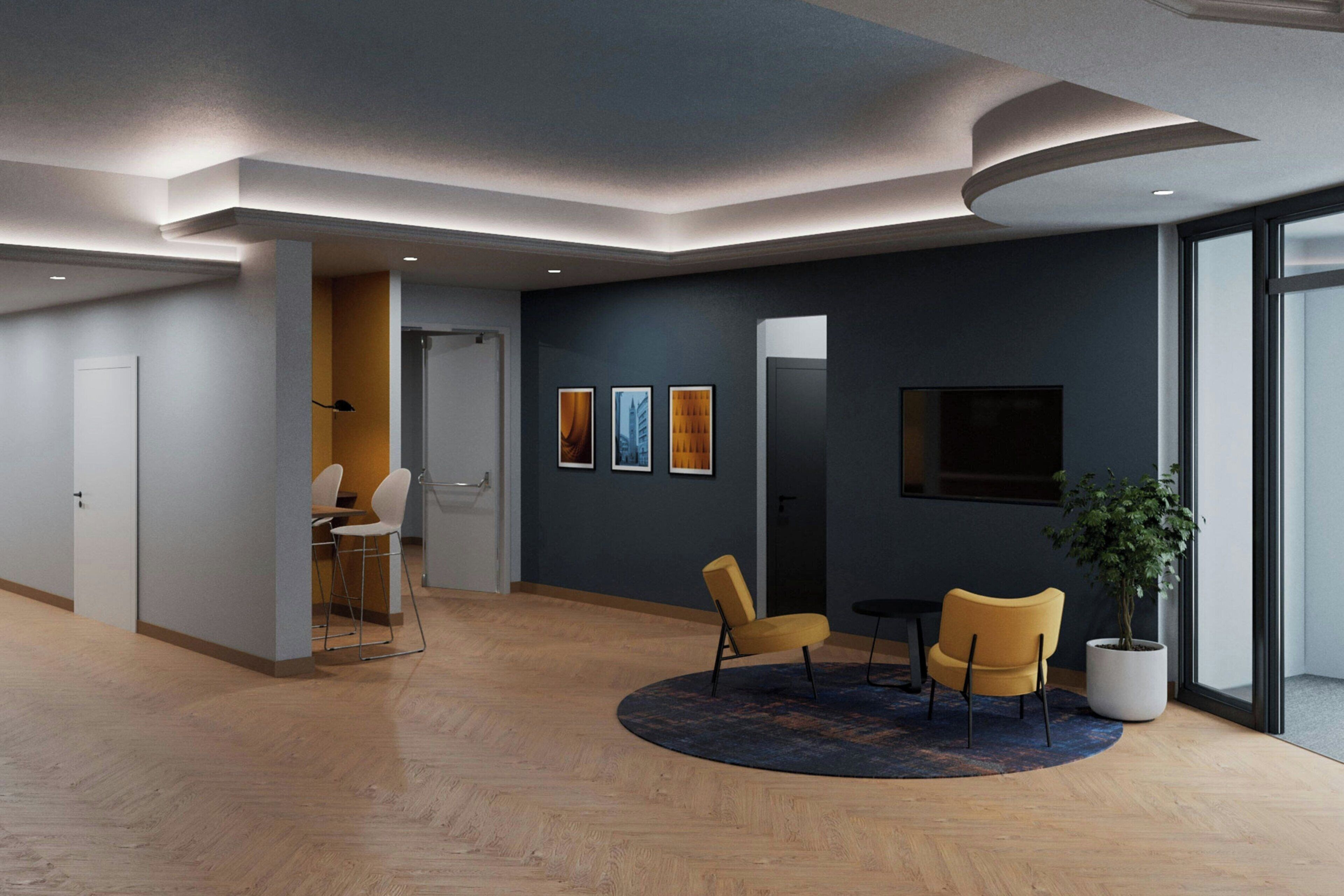 Ein modernes Interieur mit Holzboden, einem runden Teppich und zwei gelben Stühlen.