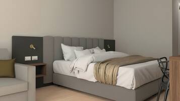 A modern bedroom with a grey bed, white bedding, a wooden nightstand, a grey armchair, and a wooden dresser.