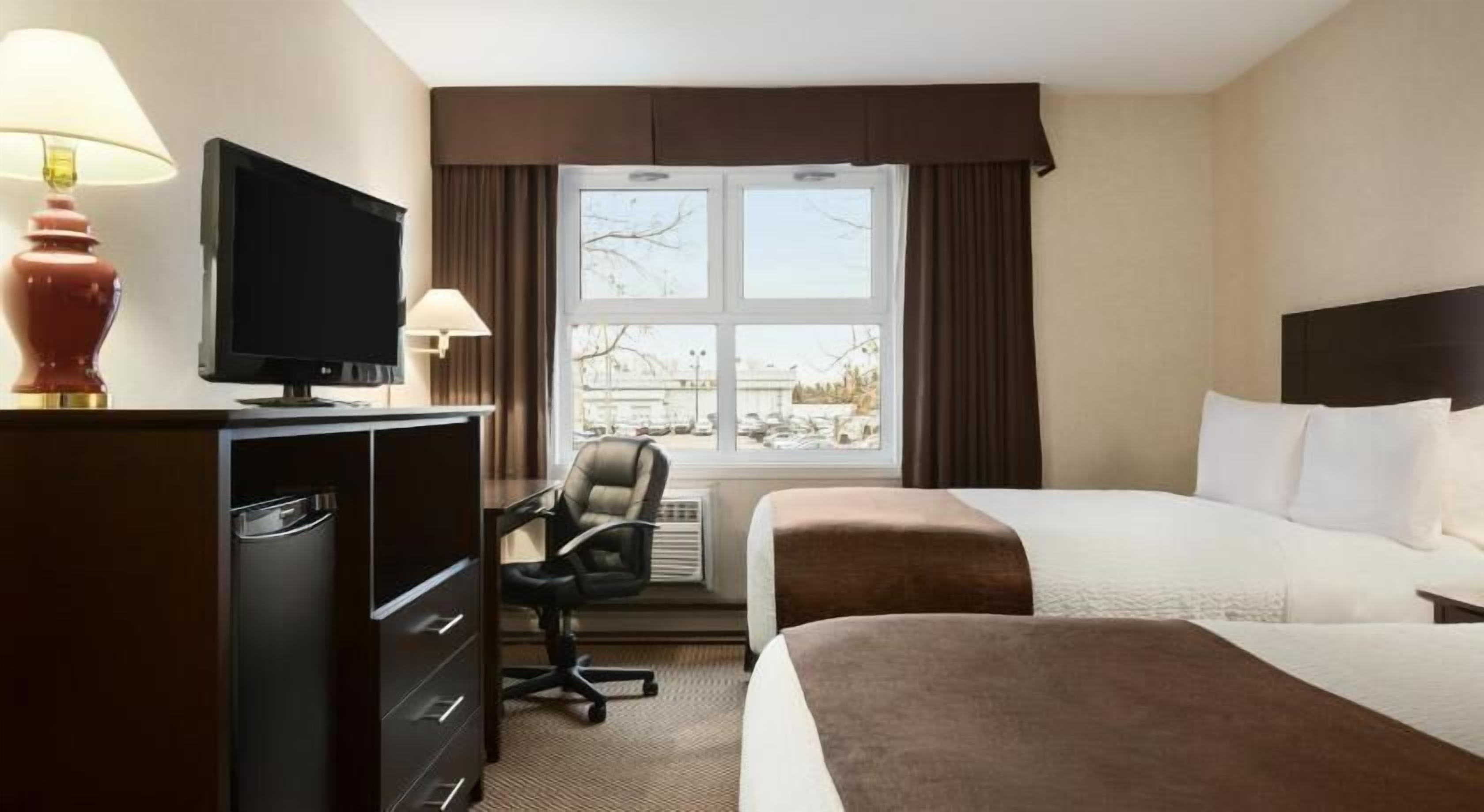 Desk, blackout drapes, soundproofing, iron/ironing board