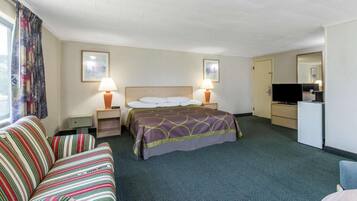 Tabla de planchar con plancha, wifi gratis y ropa de cama