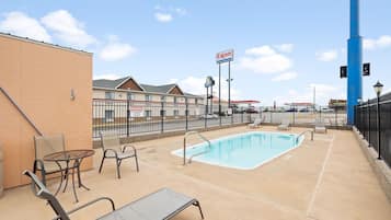 Seasonal outdoor pool, open 10:00 AM to 10:00 PM, sun loungers