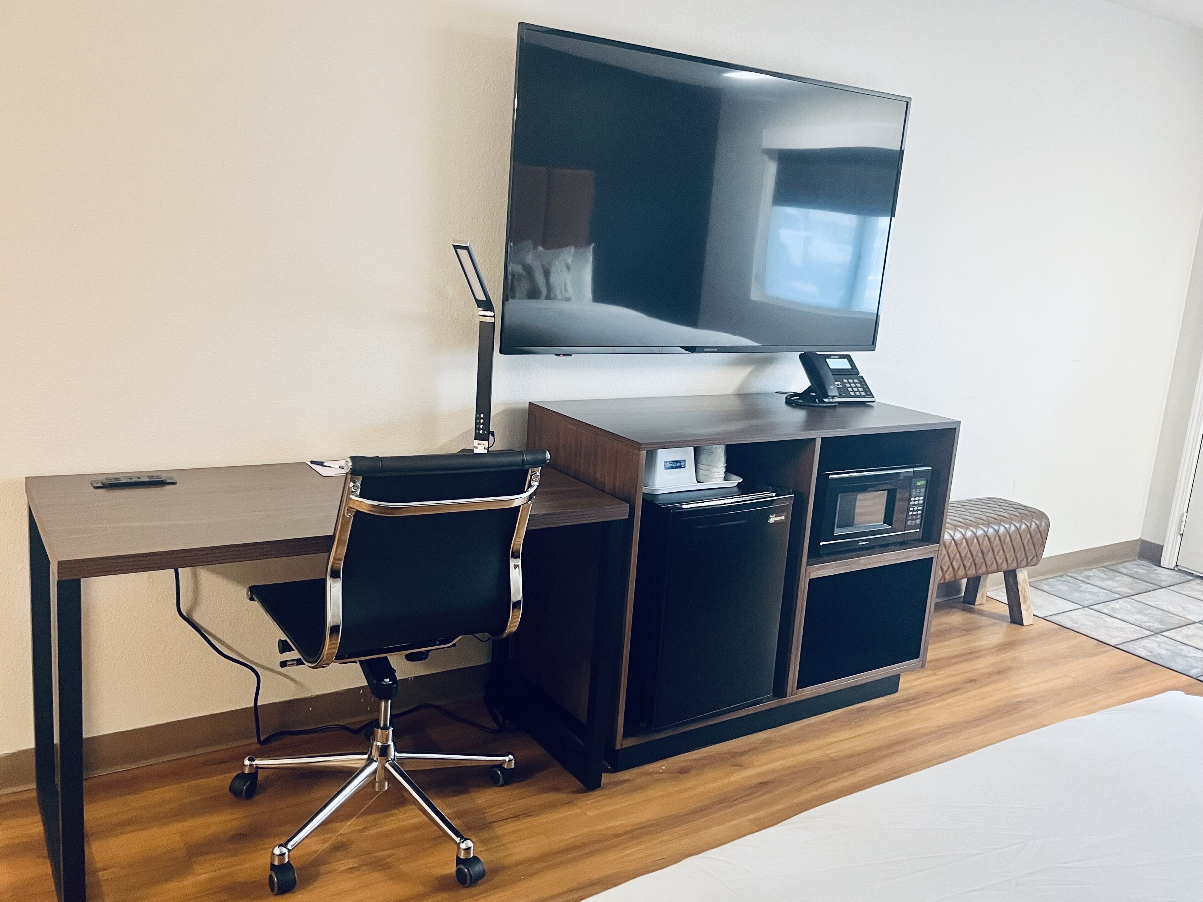 Premium bedding, pillowtop beds, desk, laptop workspace