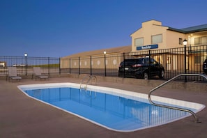 Seasonal outdoor pool, open 10:00 AM to 10:00 PM, sun loungers