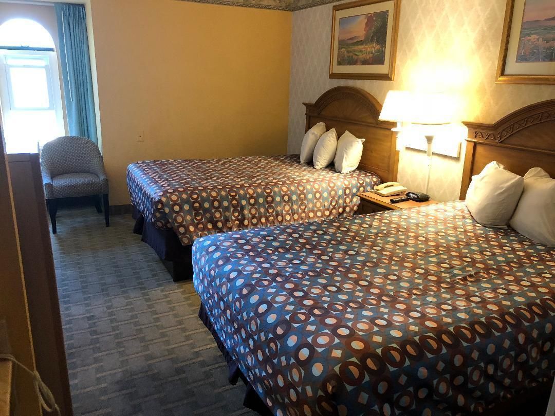 Standard Double Room, 2 Double Beds | Premium bedding, blackout drapes, iron/ironing board, rollaway beds