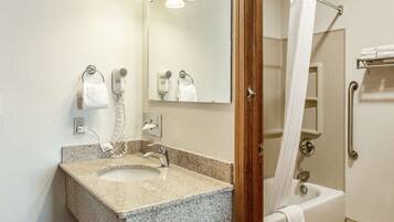 Combined shower/bathtub, deep-soaking bathtub, free toiletries
