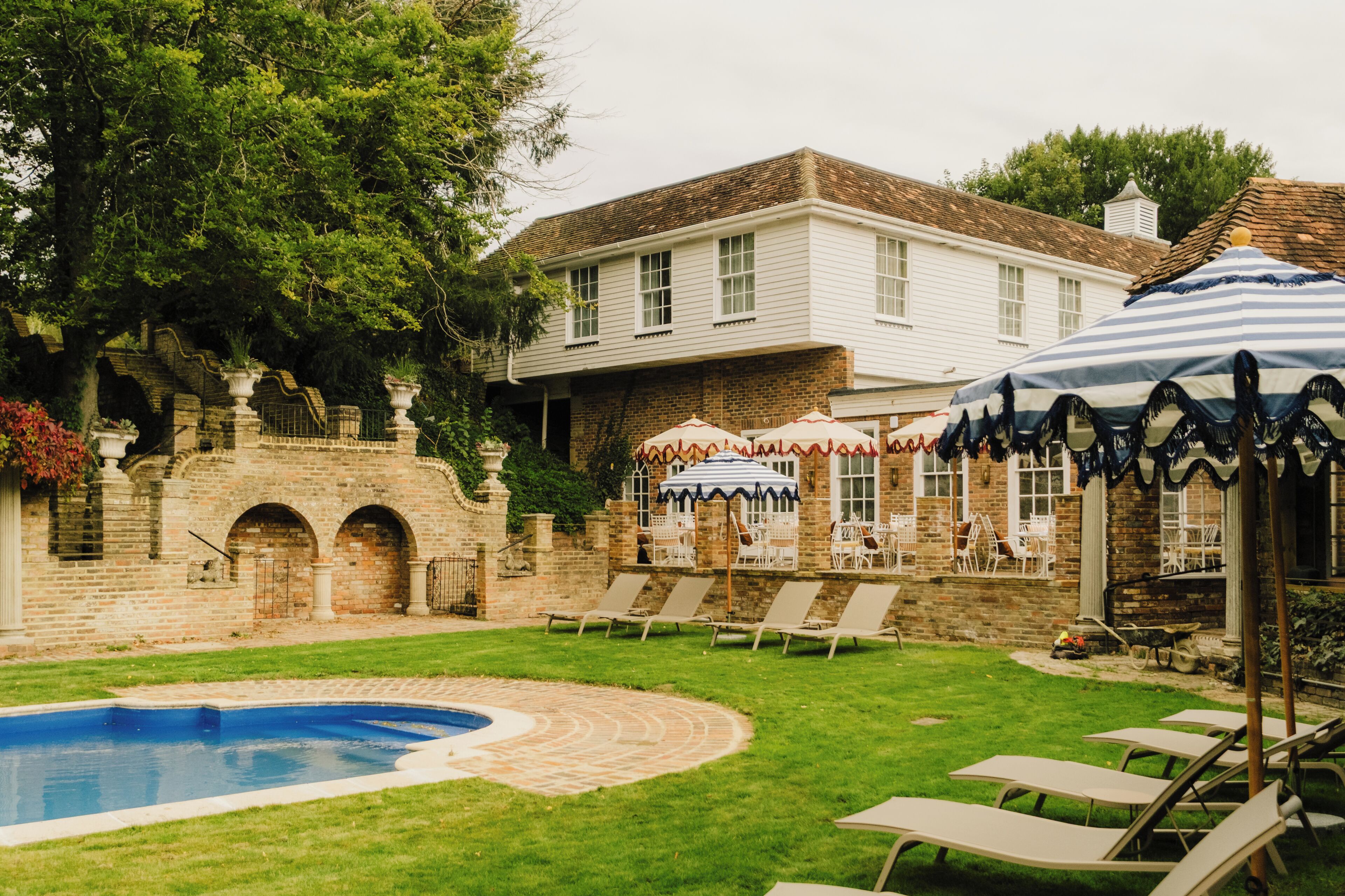Seasonal outdoor pool, pool umbrellas, sun loungers