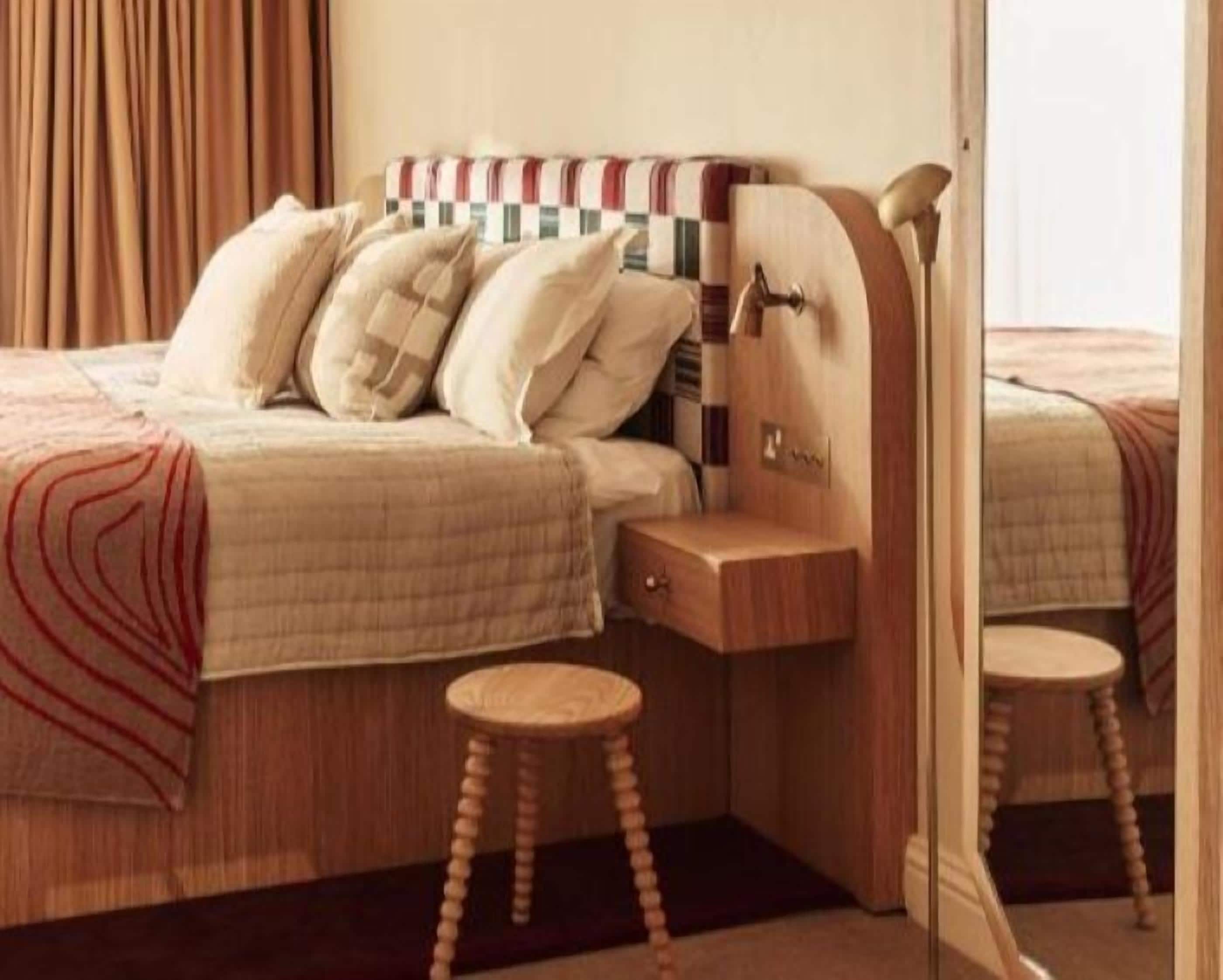 Down duvets, desk, blackout curtains, iron/ironing board