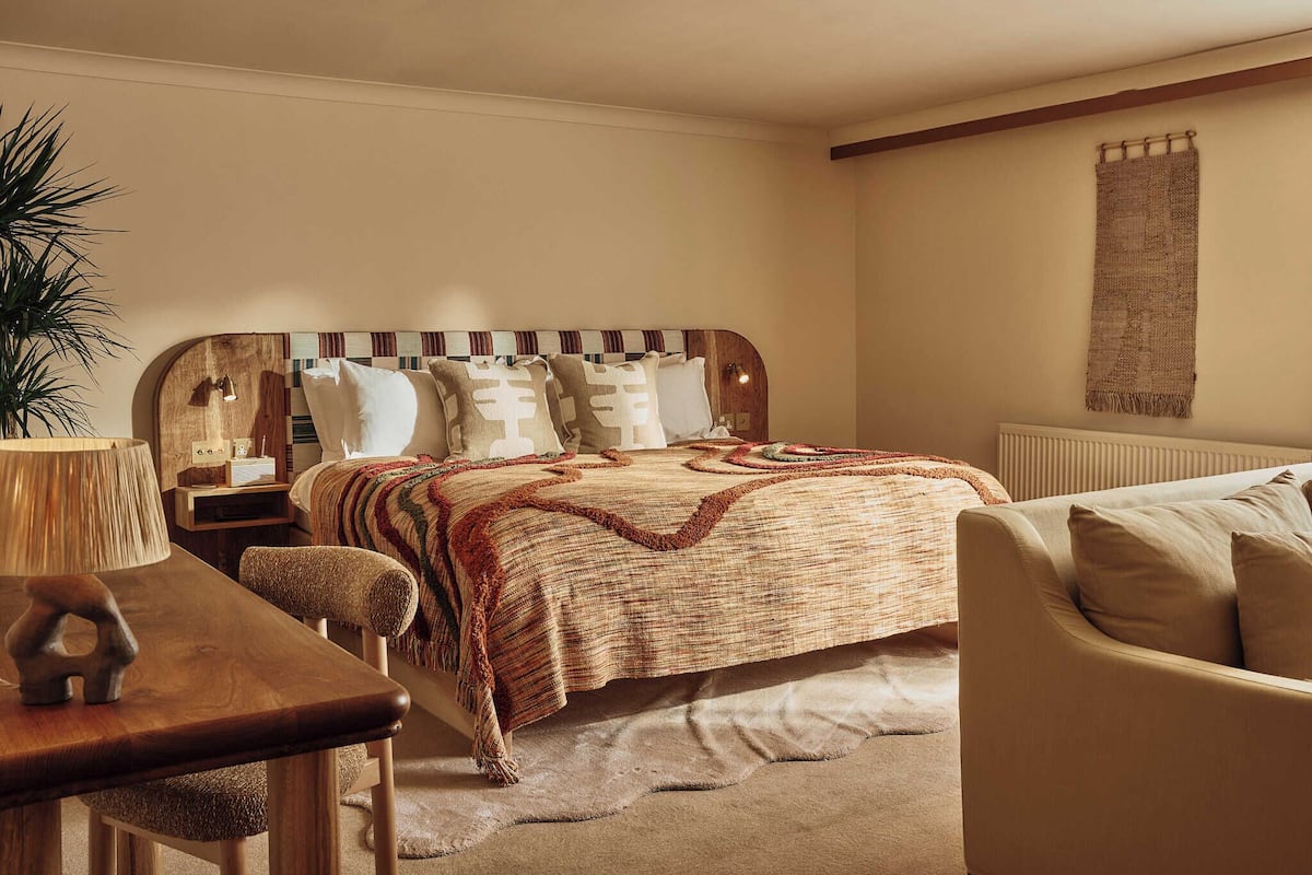 Suite | Down comforters, desk, blackout drapes, iron/ironing board