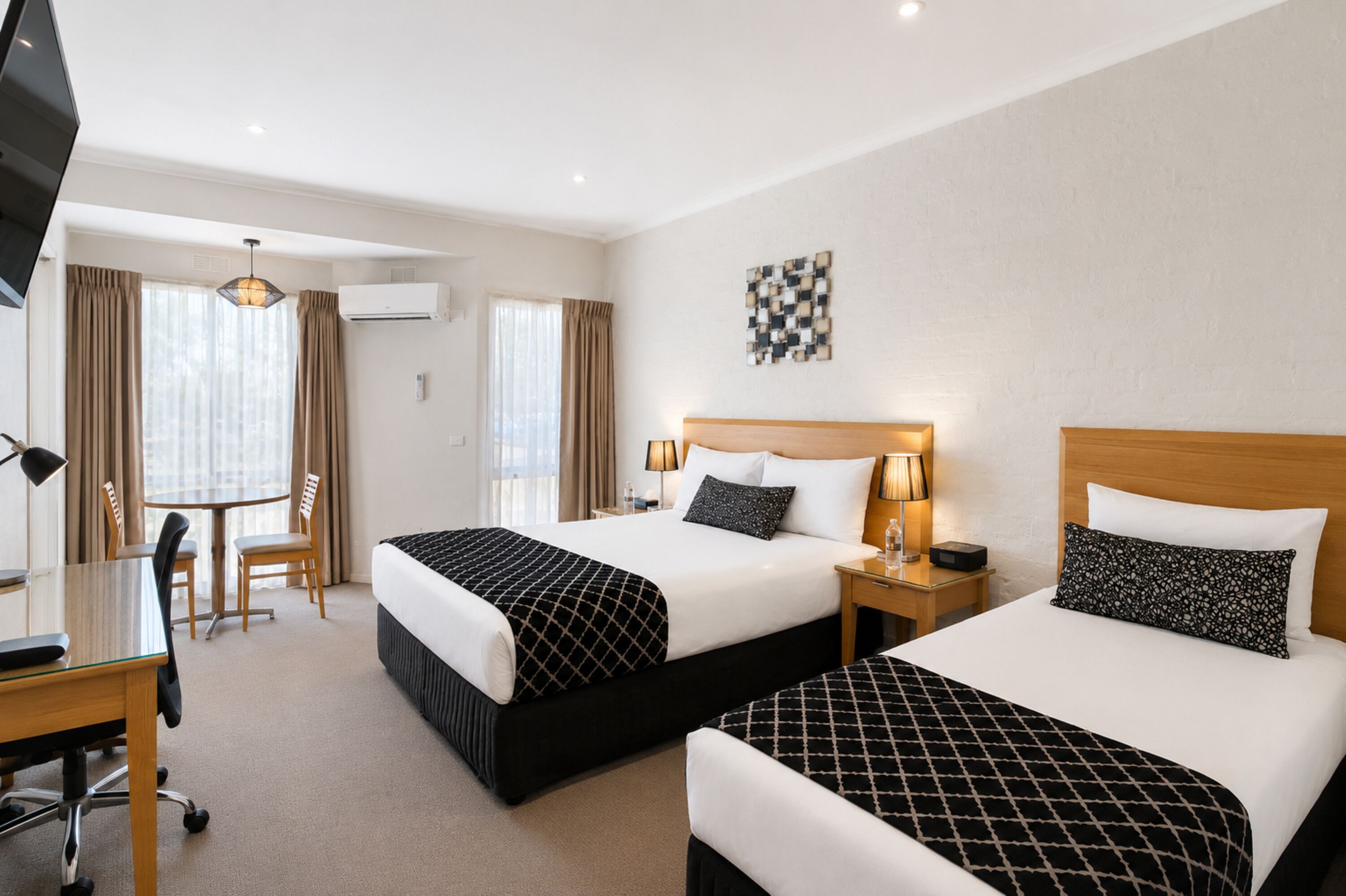 Standard Room, Multiple Beds, Non Smoking | Pillowtop beds, free minibar, desk, laptop workspace