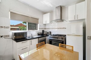 Apartment, 2 Bedrooms | Private kitchen | Espresso maker, coffee/tea maker, microwave, electric kettle