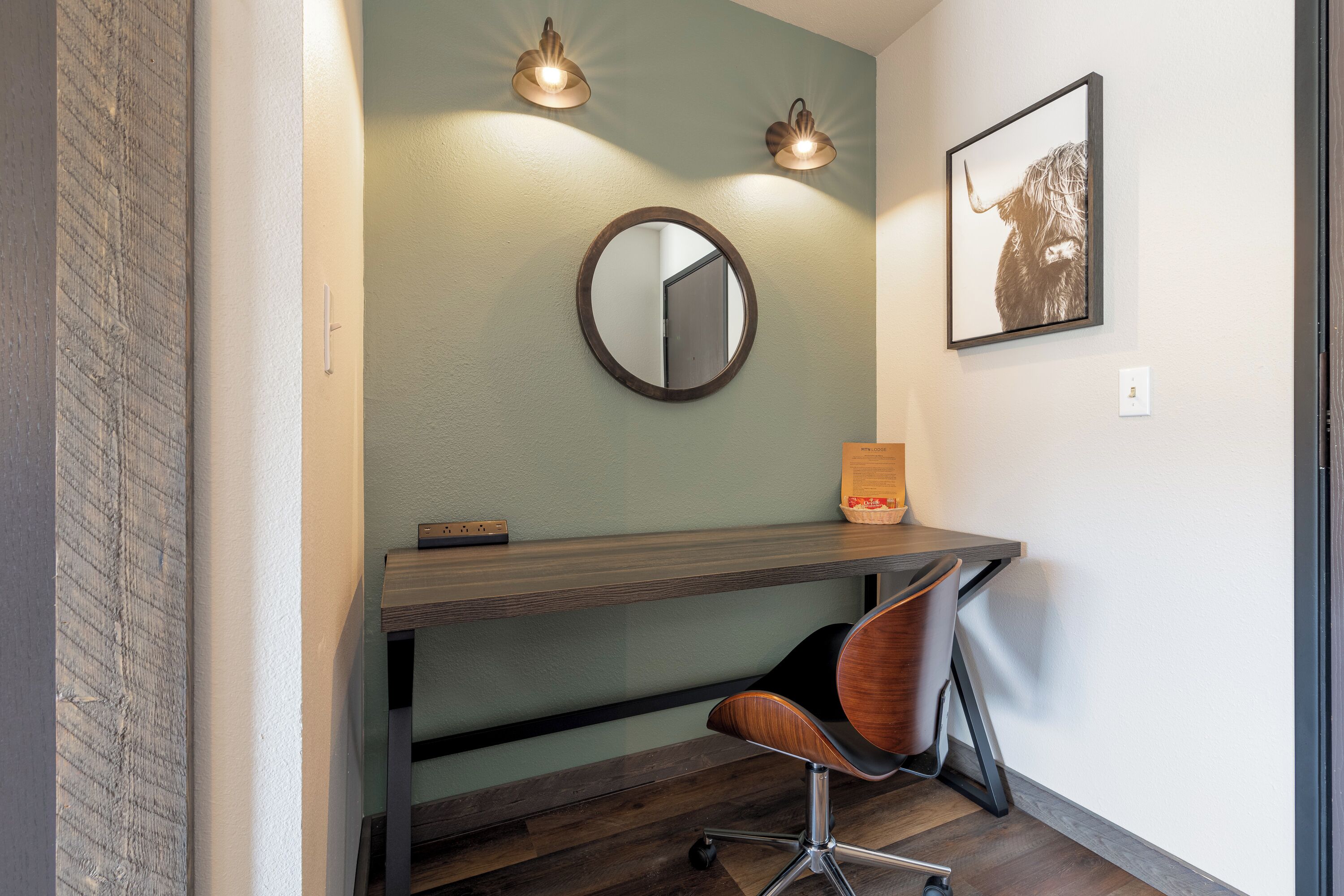 deluxe suite, 1 king bed with sofa bed, kitchenette, mountain view | living area | 50-inch smart tv with cable channels, tv