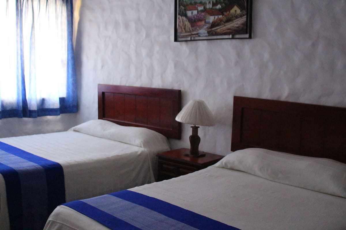 Suíte júnior, 1 quarto, cozinha americana, de frente para o mar | 1 quarto, roupas de cama premium, cortinas blackout