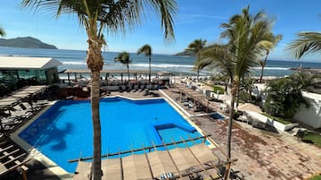 Outdoor pool, pool umbrellas, sun loungers