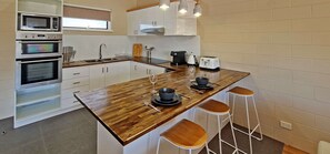 Apartment, 1 Bedroom, Non Smoking (1 King Bed) | Blackout drapes, soundproofing, iron/ironing board, free WiFi