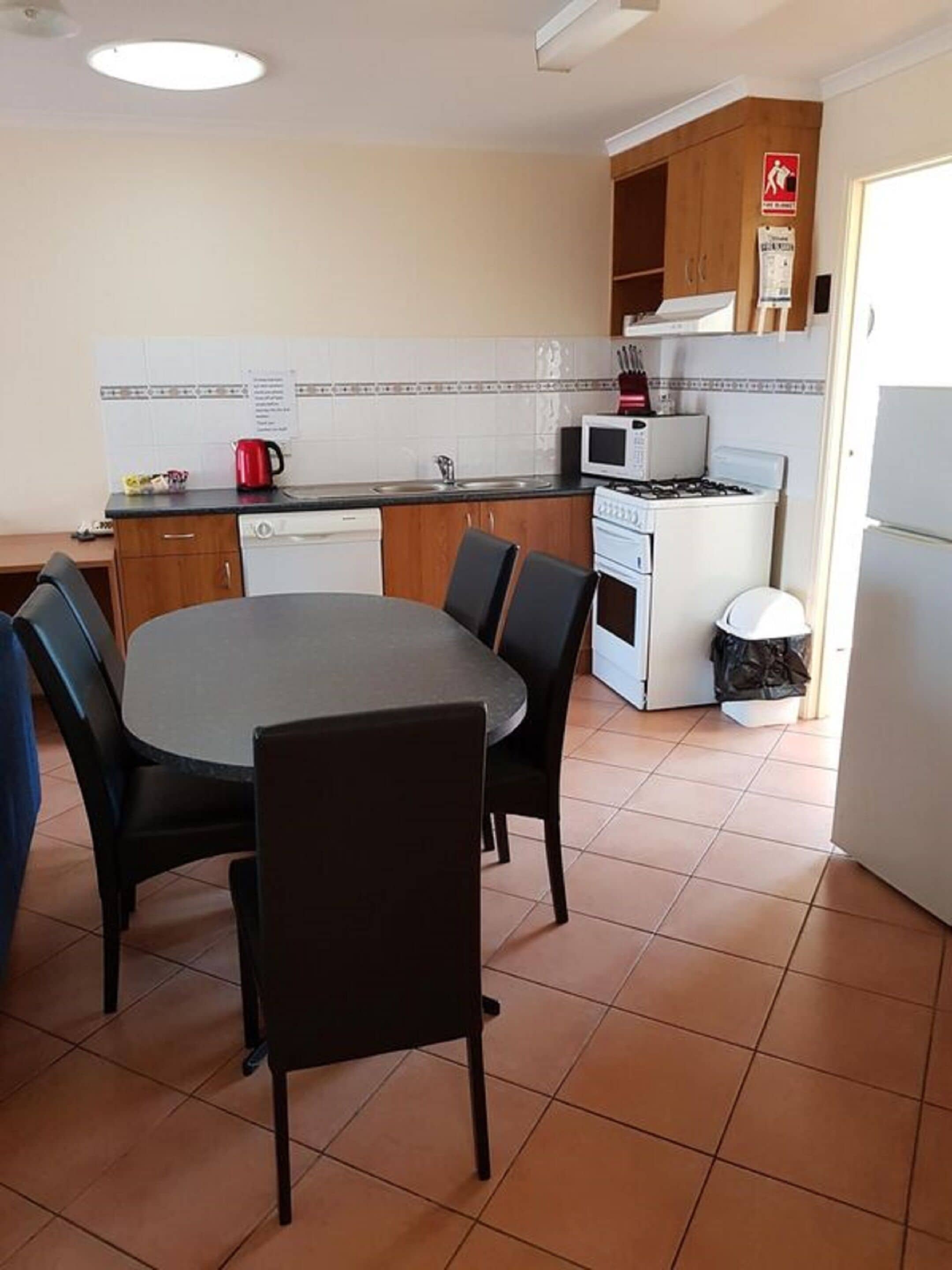 two bedroom family apartment | private kitchen | fridge, coffee/tea maker, electric kettle, dining tables