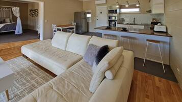 Apartment, 1 Bedroom, Non Smoking (1 King Bed) | Blackout curtains, soundproofing, iron/ironing board, free WiFi