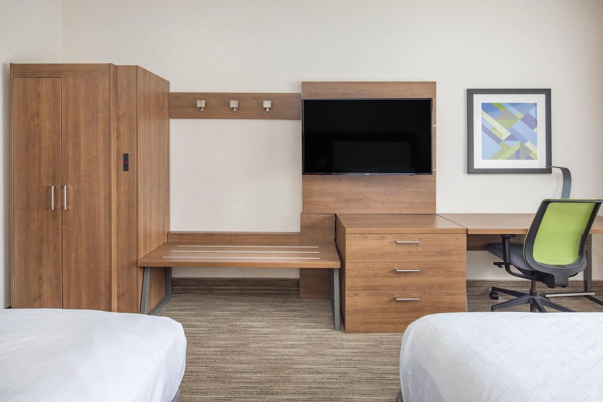 In-room safe, desk, iron/ironing board, cribs (free)