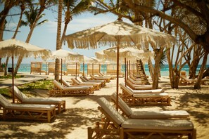 Private beach, sun loungers, beach towels, snorkeling