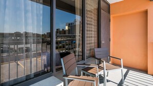 Desk, laptop workspace, blackout drapes, iron/ironing board - Red Roof Inn PLUS+ & Suites Virginia Beach – Seaside (Virginia Beach)