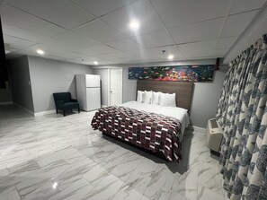 Superior Room, 1 King Bed (Kitchen, Smoke Free) | Desk, laptop workspace, blackout drapes, iron/ironing board