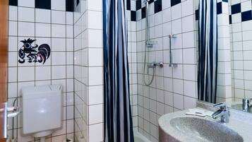 Shower, free toiletries, hair dryer, towels